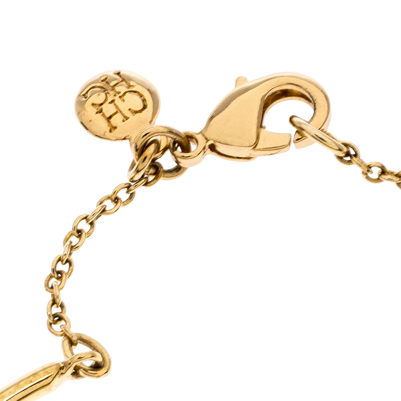 Carolina Herrera Crystal Embedded Floral Gold Tone Bracelet Women