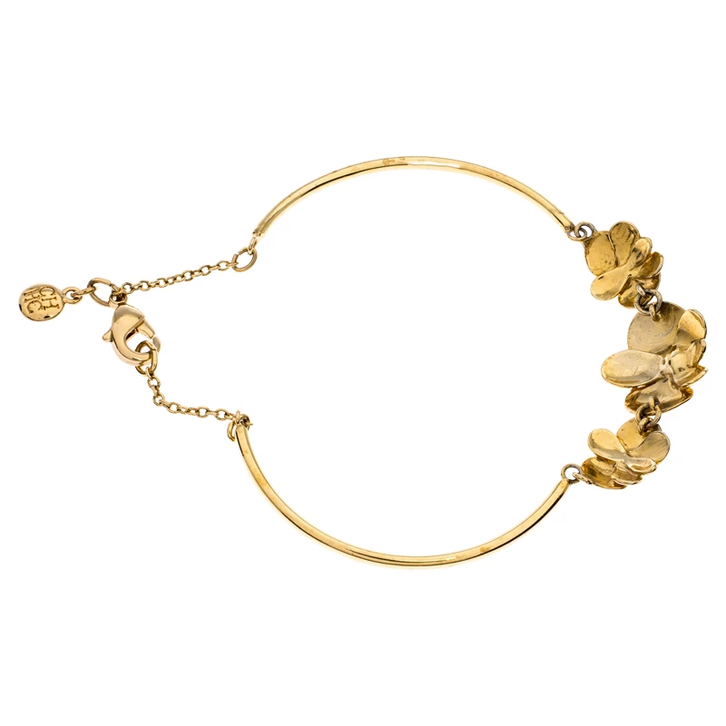 Carolina Herrera Crystal Embedded Floral Gold Tone Bracelet Women