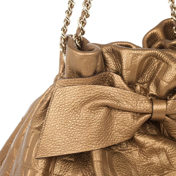 Carolina Herrera Gold Monogram Embossed Bag Women