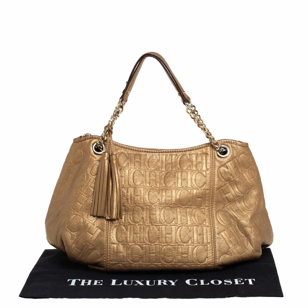 Carolina Herrera Golden Brown Monogram Embossed Leather Tassel Hobo Women
