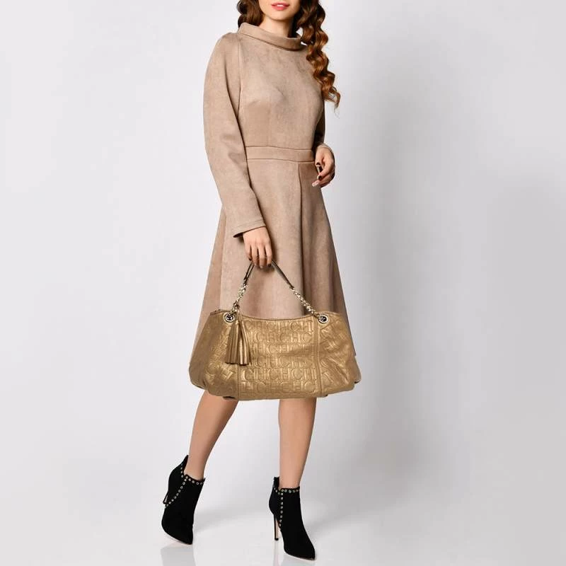 Carolina Herrera Golden Brown Monogram Embossed Leather Tassel Hobo Women