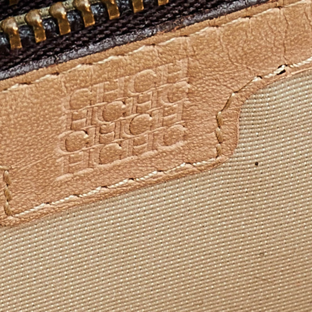 Carolina Herrera Blue Monogram Embossed Leather Zip Around Wallet Women