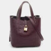 Carolina Herrera Burgundy Monogram Embossed Leather Small Matryoshka Locked Tote Women