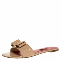 Carolina Herrera Beige CH Logo Embossed Patent Bow Detail Flat Slides Size 41 Women